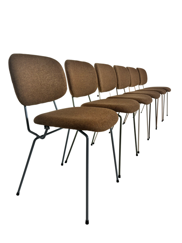 Row of brown chairs with black legs on a white background