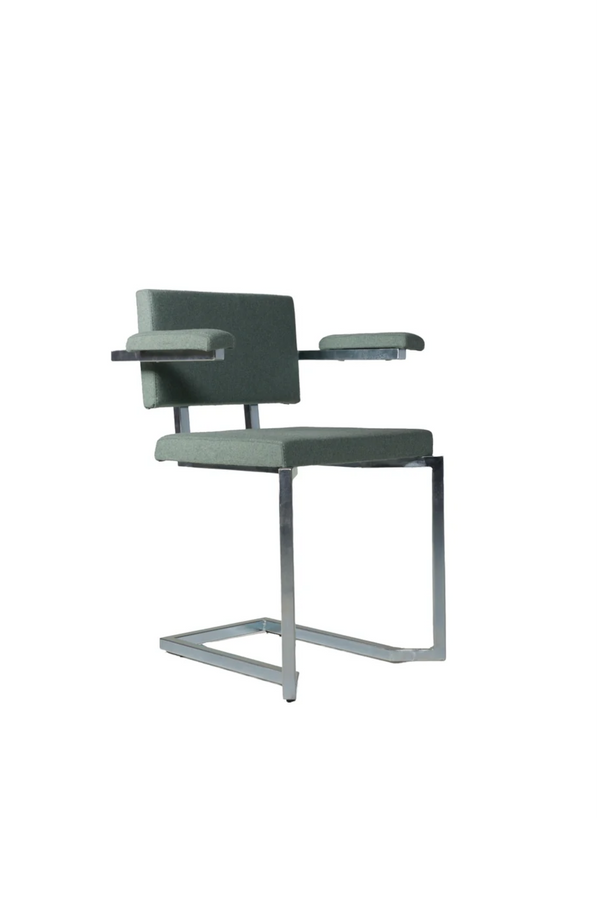 AVL Koker Chair - with armrests - light green, sage wool upholstery viewed at an angle on chrome