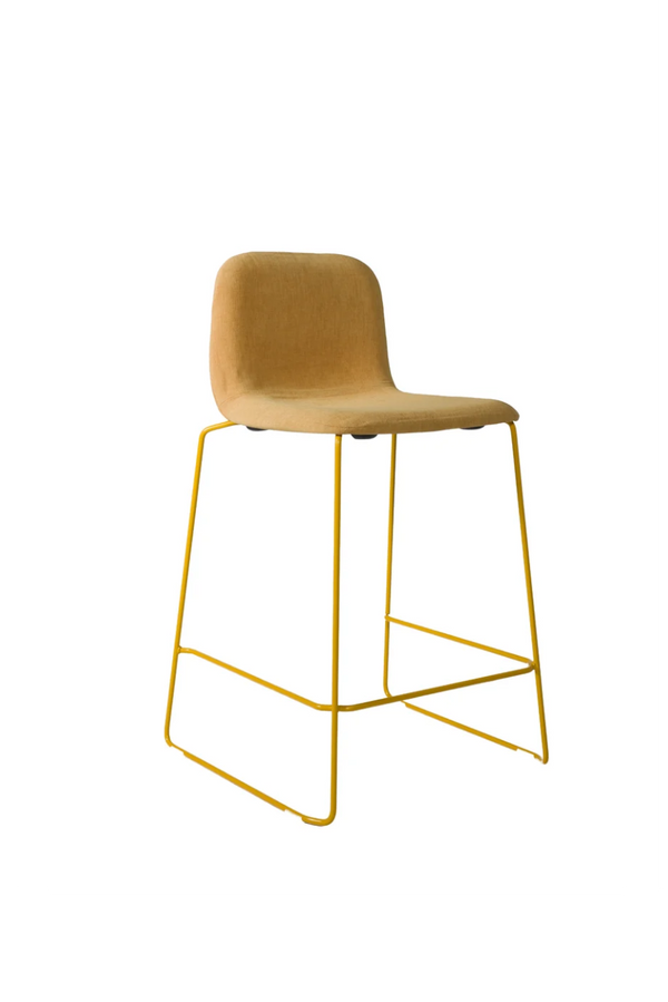 THIS 641 Barstool High back yellow upholstered, honey fabric shell on a yellow sled frame with footrest